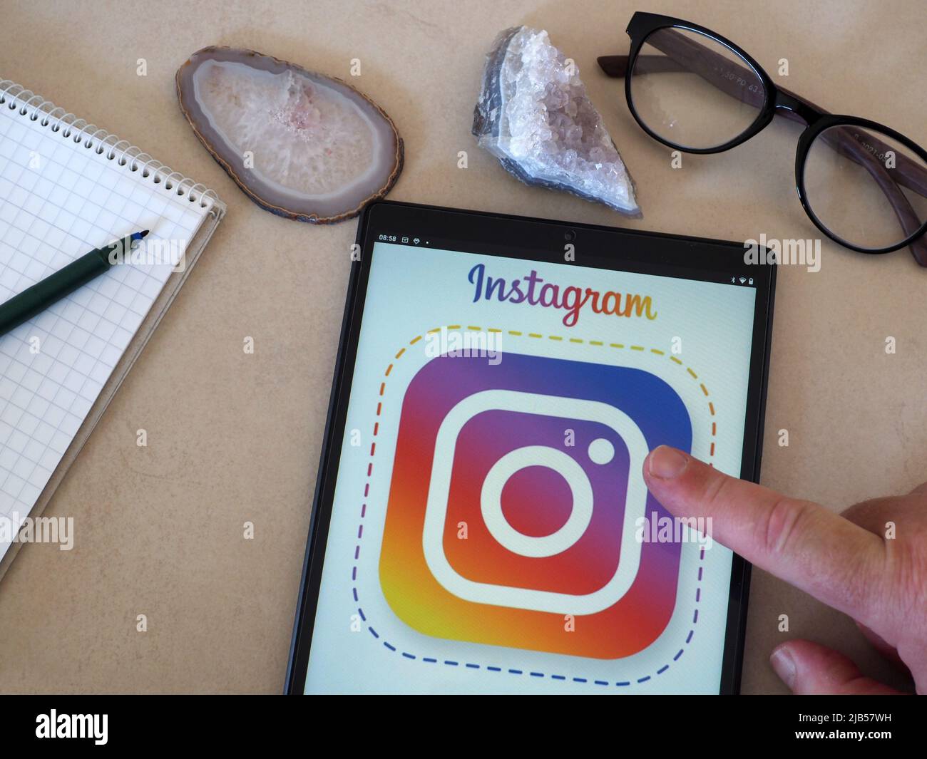 In this photo illustration Instagram logo seen displayed on a tablet
