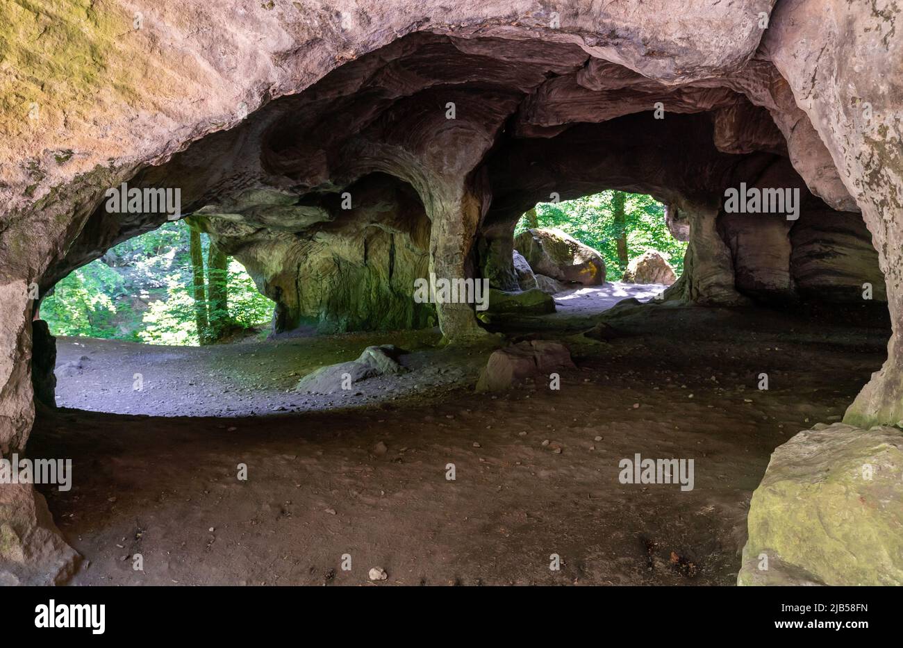 A view of the historic Hohllay Roman cave used for making millstones in the Mullerthal region of Luxembourg Stock Photo