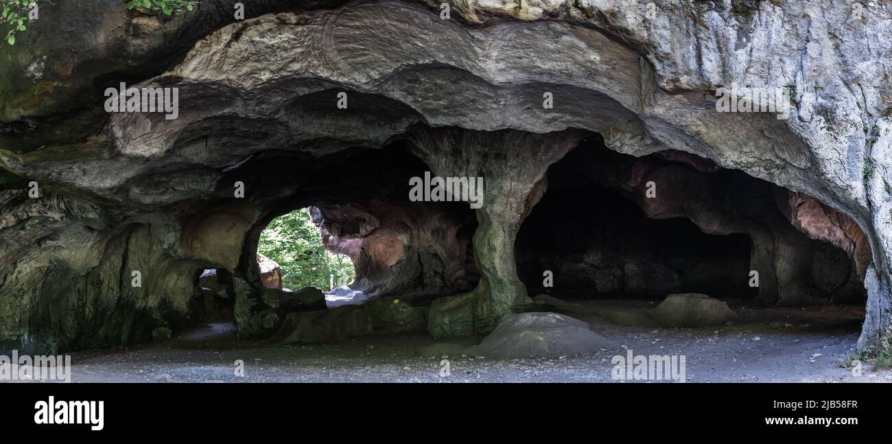 A panorama view of the historic Hohllay Roman cave used for making millstones in the Mullerthal region of Luxembourg Stock Photo