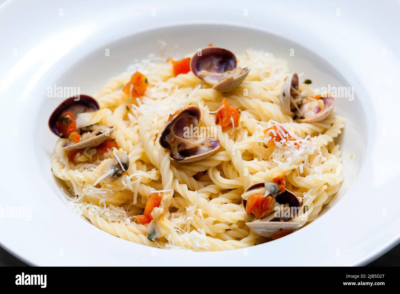 pasta with mussels and cherry tomatoes Stock Photo Alamy