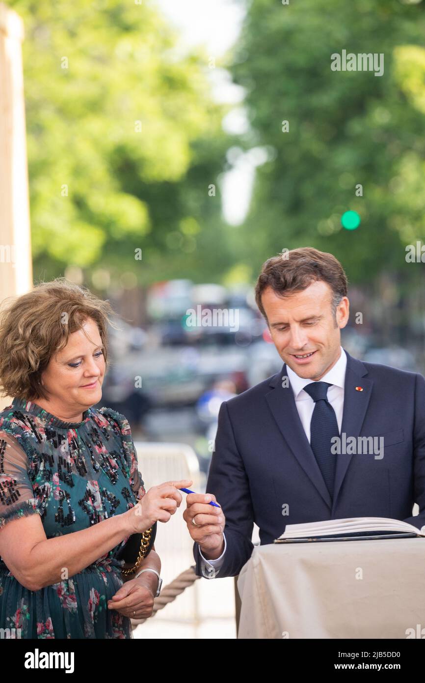 British Ambassador to France Menna Rawlings and French President Emmanuel Macron attend the