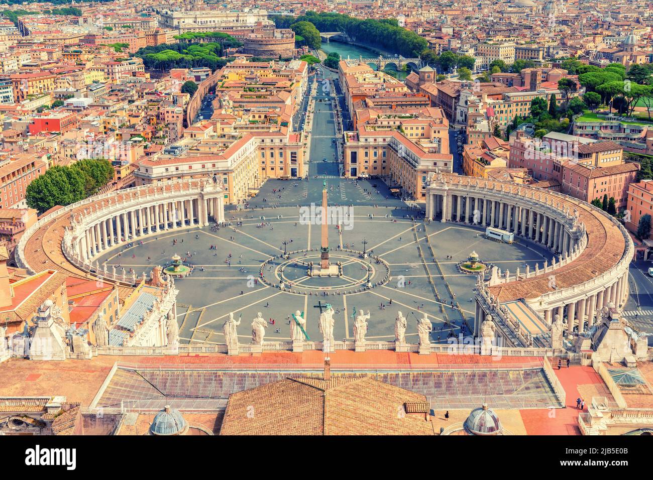 Statues on the top of basilica of st peter hires stock photography and