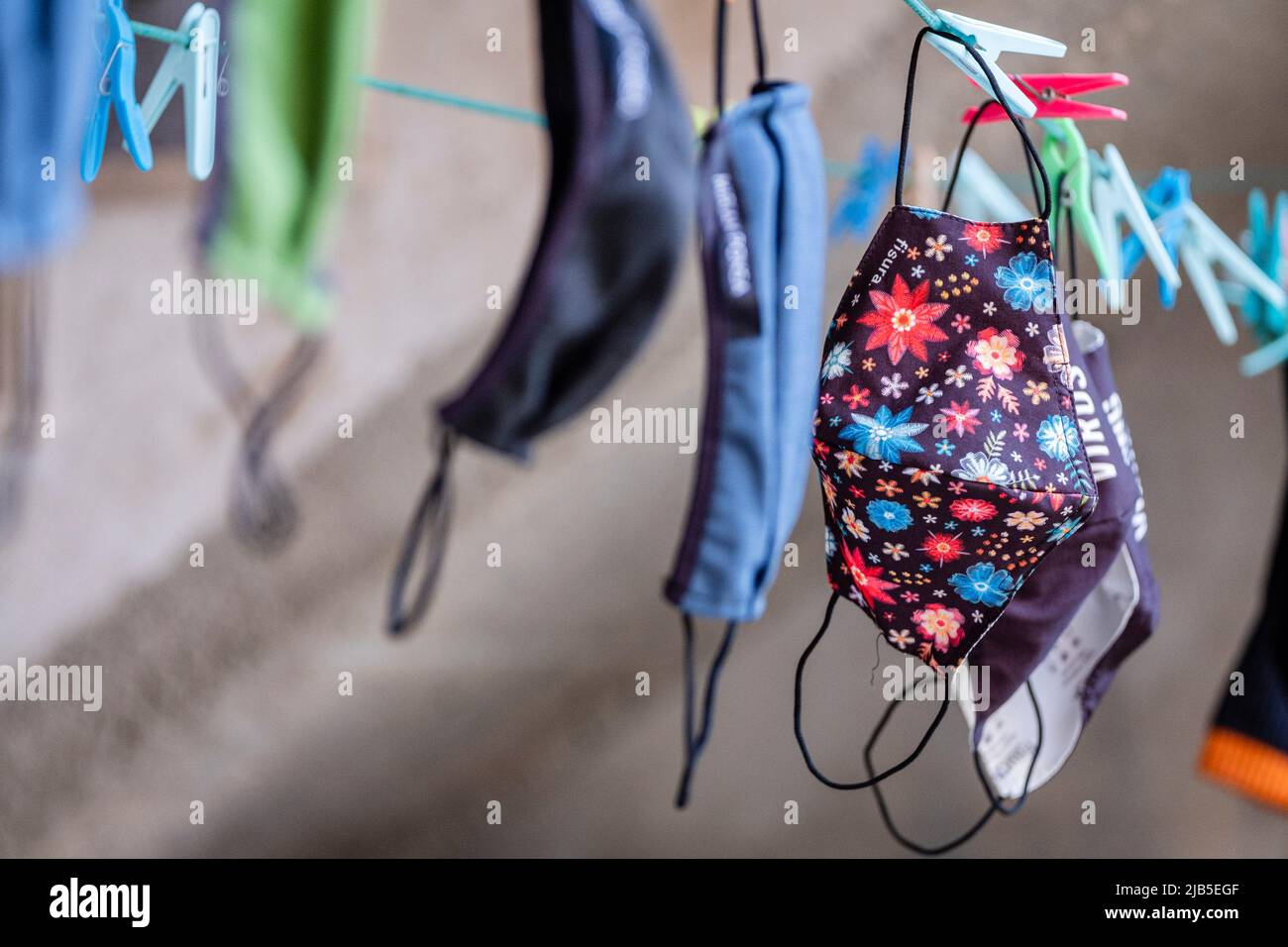 laundry of antivirus masks hanging in a dryer Stock Photo Alamy