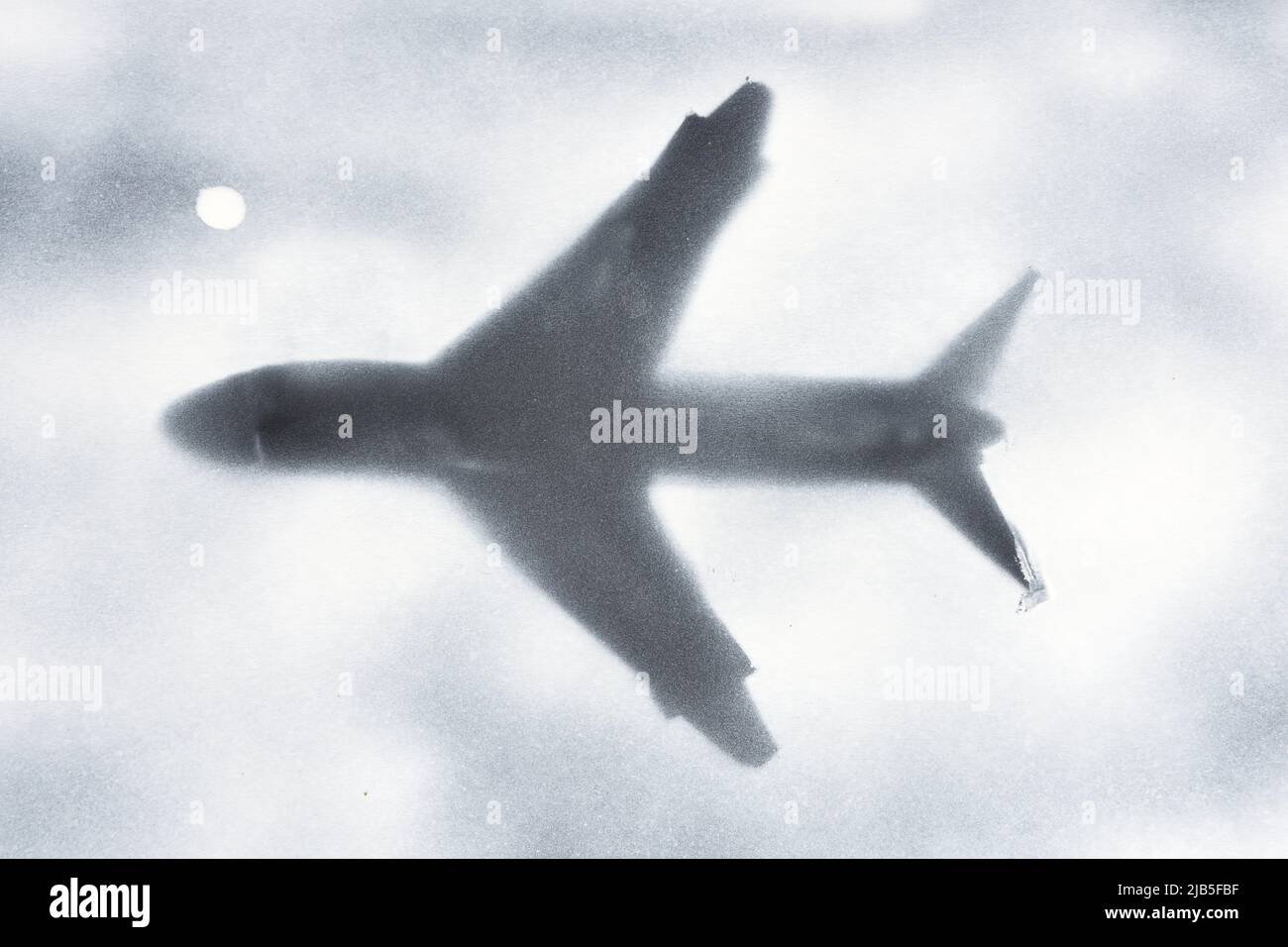 drawing of a plane with spray paint on black paper background Stock Photo Alamy