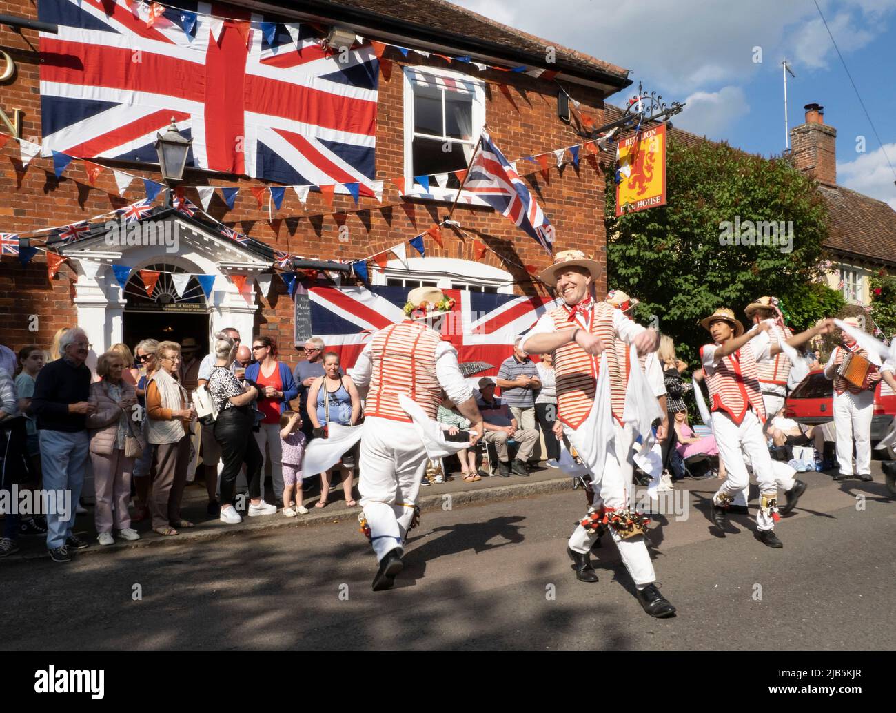 Steeple Bumpstead, Essex. 3rd June 2022. Morris Dancers from Thaxted perform outside The Red Lion public house in the quaint Essex village of Steeple Bumpstead as Jubilee celebrations continue. Credit: Jason Mitchell/Alamy Live News. Stock Photo