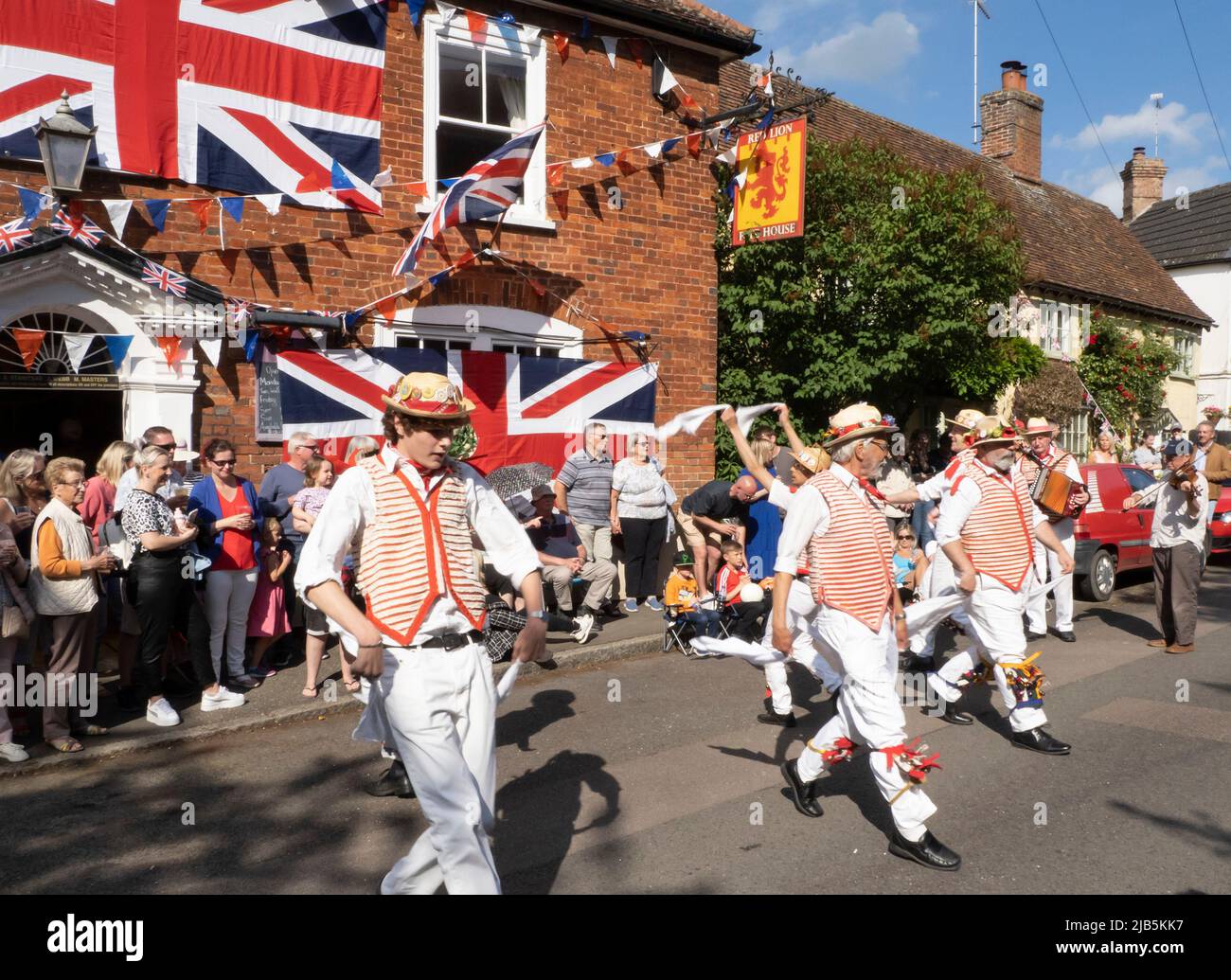 Steeple Bumpstead, Essex. 3rd June 2022. Morris Dancers from Thaxted perform outside The Red Lion public house in the quaint Essex village of Steeple Bumpstead as Jubilee celebrations continue. Credit: Jason Mitchell/Alamy Live News. Stock Photo