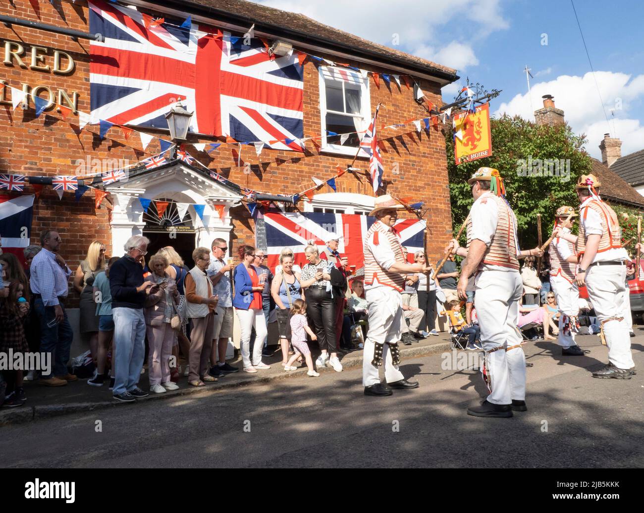 Steeple Bumpstead, Essex. 3rd June 2022. Morris Dancers from Thaxted perform outside The Red Lion public house in the quaint Essex village of Steeple Bumpstead as Jubilee celebrations continue. Credit: Jason Mitchell/Alamy Live News. Stock Photo