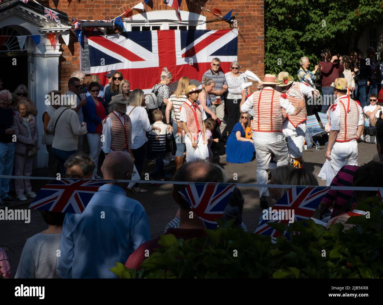 Steeple Bumpstead, Essex. 3rd June 2022. Morris Dancers from Thaxted perform outside The Red Lion public house in the quaint Essex village of Steeple Bumpstead as Jubilee celebrations continue. Credit: Jason Mitchell/Alamy Live News. Stock Photo