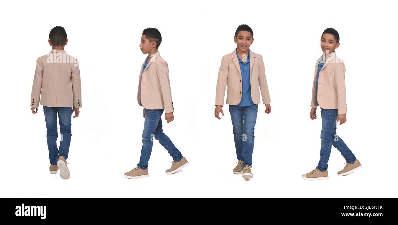 group of same boy with various poses walking on white background. Stock Photo