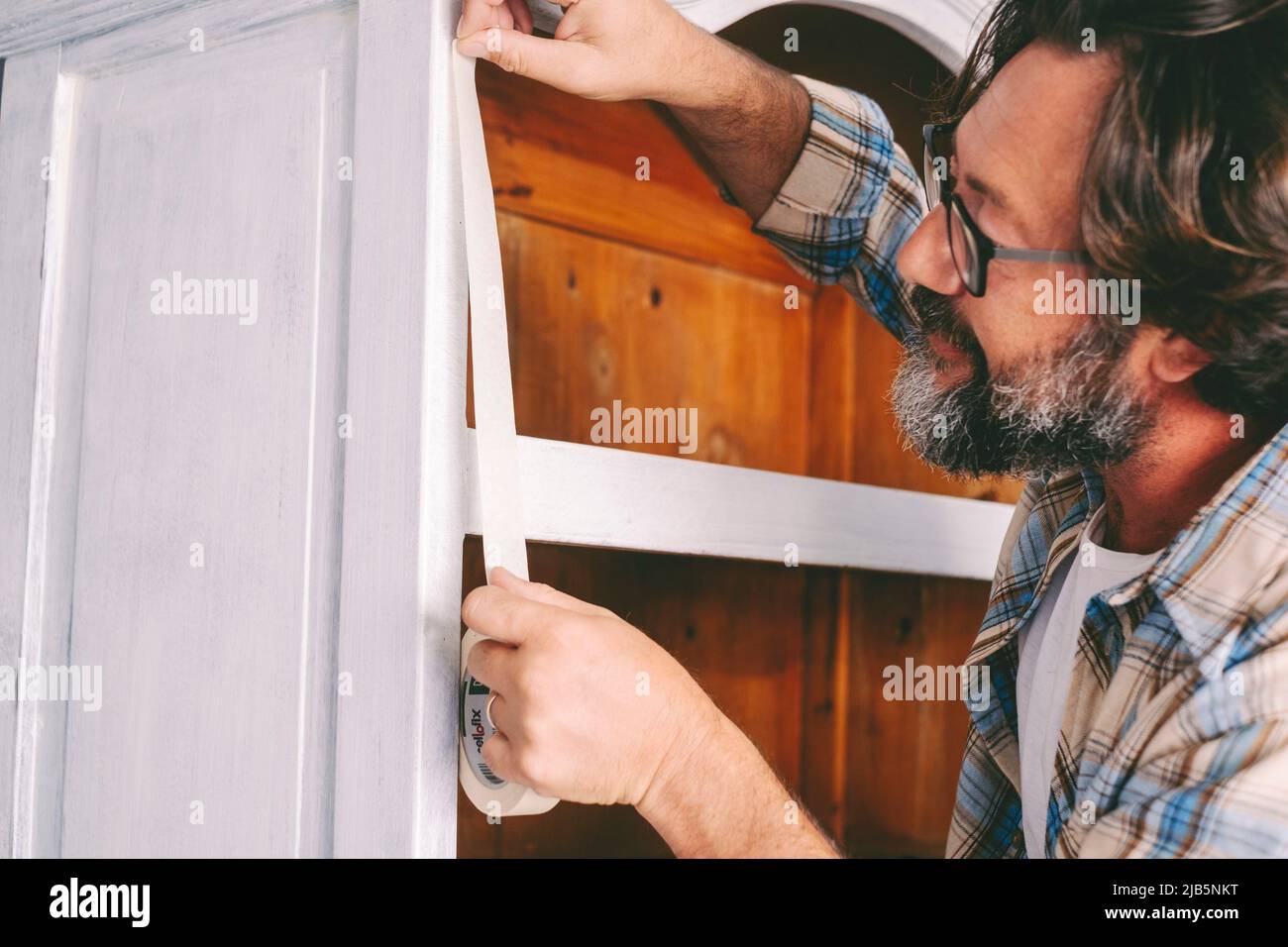 People and diy hobby work at home concept leisure activity. Adult man