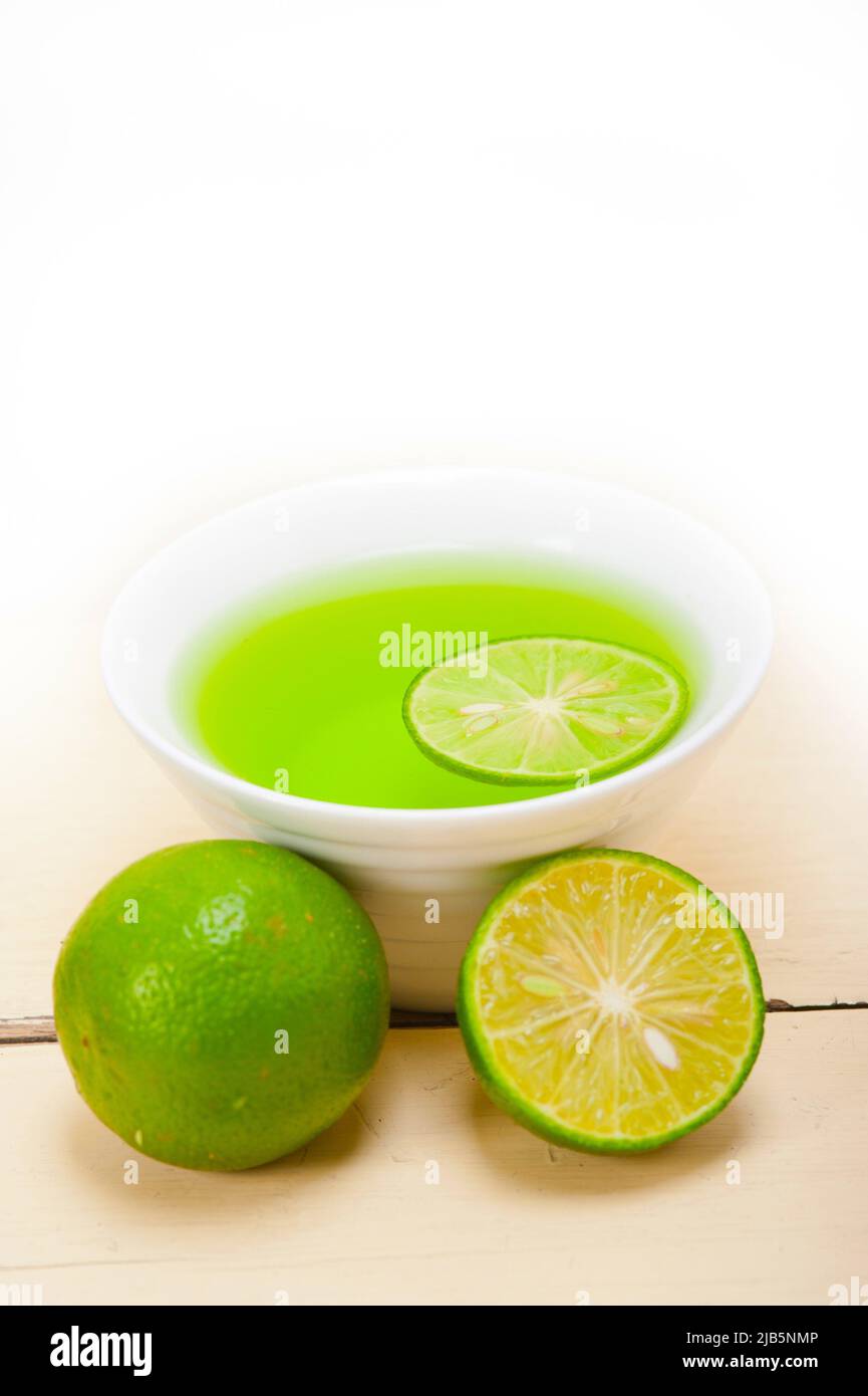 fresh and healthy green lime lemonade macro closeup. Stock Photo