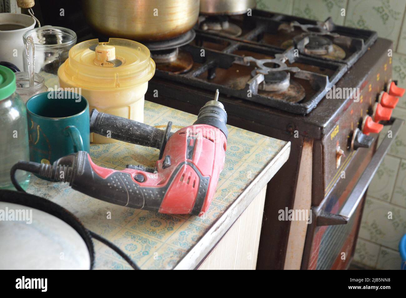 Installing a kitchen hood for the ventilation Stock Photo Alamy