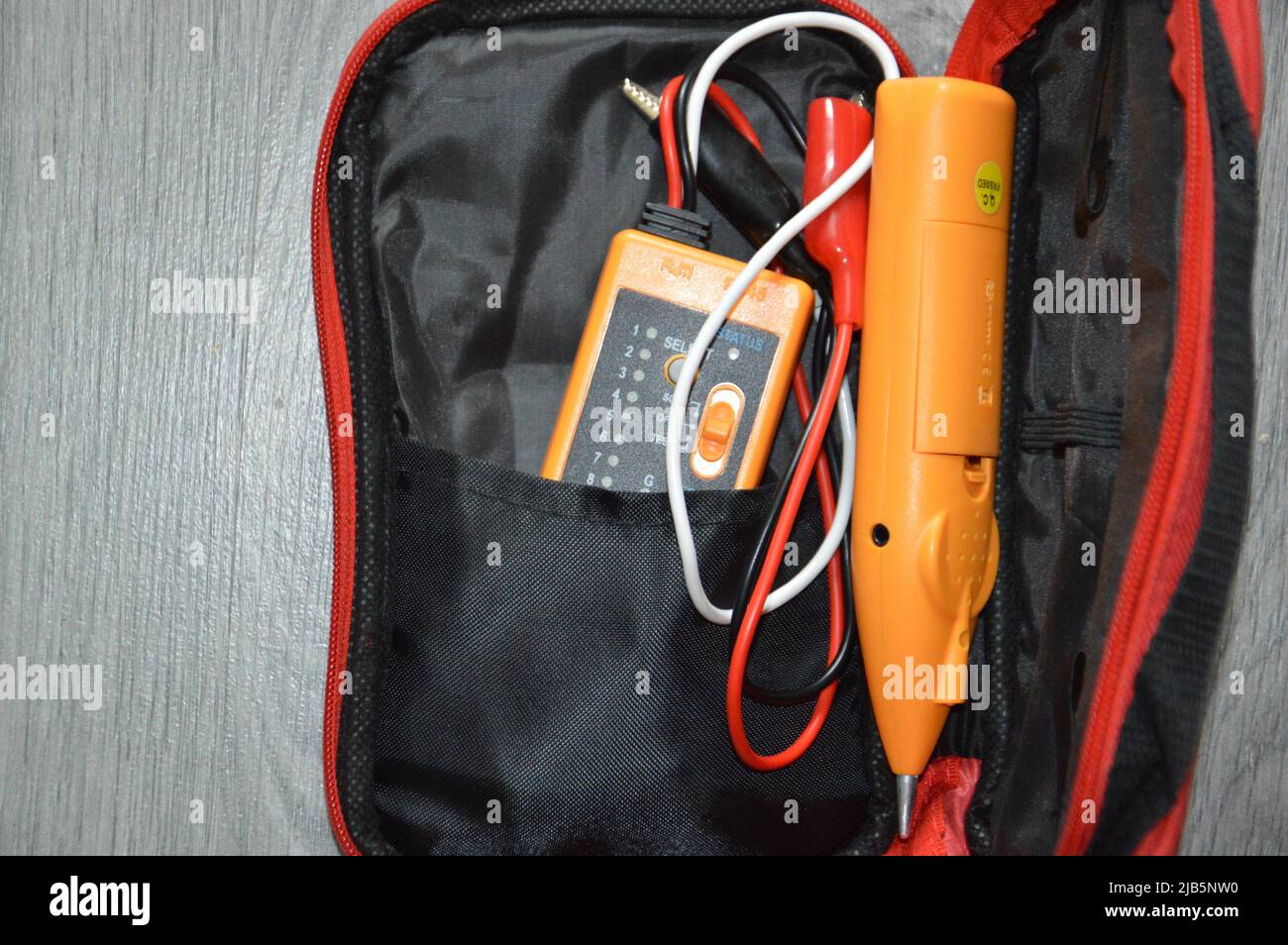 Tools for an electrician to install a the fire alarm. Stock Photo