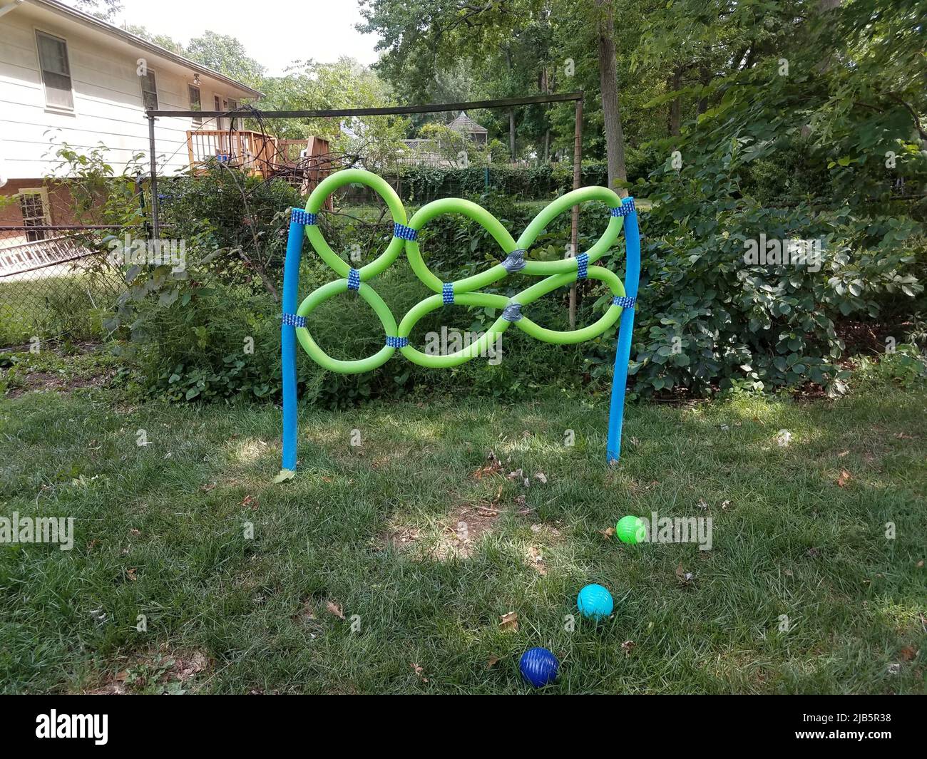 blue and green foam throwing target for kids Stock Photo Alamy