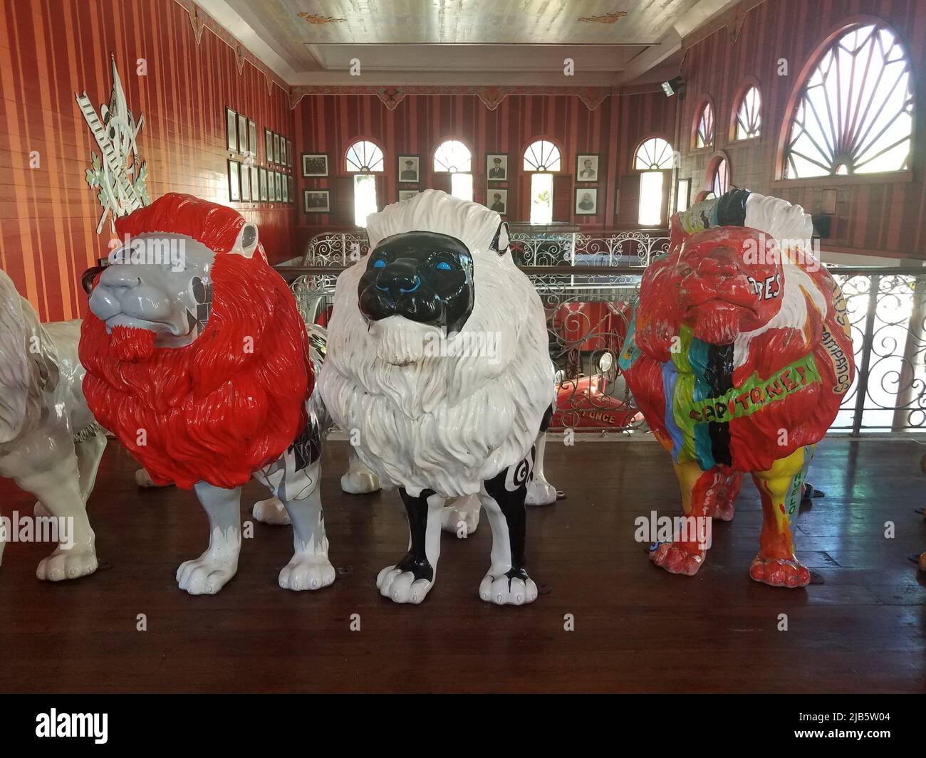 brightly colored or painted lion statues in Ponce, Puerto Rico Stock