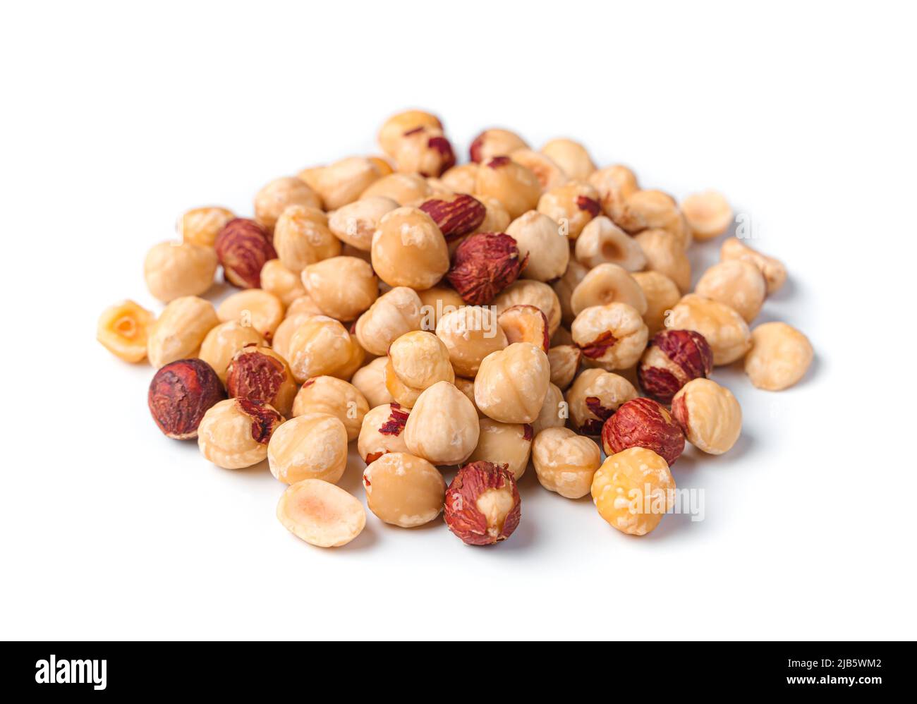 Peeled hazelnuts are isolated on a white background. Stock Photo