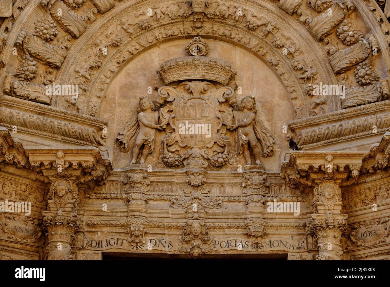 Shield of the sponsor of the works, Ramon de Verí, Monti-sion church portal, Jesuit convent, Palma, Mallorca, Balearic Islands, Spain, Europe. Stock Photo