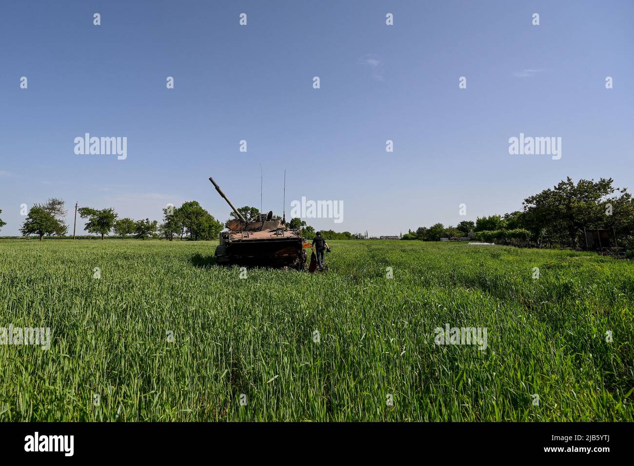 A destroyed Russian military vehicle is pictured in a green field in Novopil, a village liberated from Russian invaders, Donetsk Region, eastern Ukraine, May 31, 2022. Photo by Dmytro Smoliyenko/Ukrinform/ABACAPRESS.COM Stock Photo