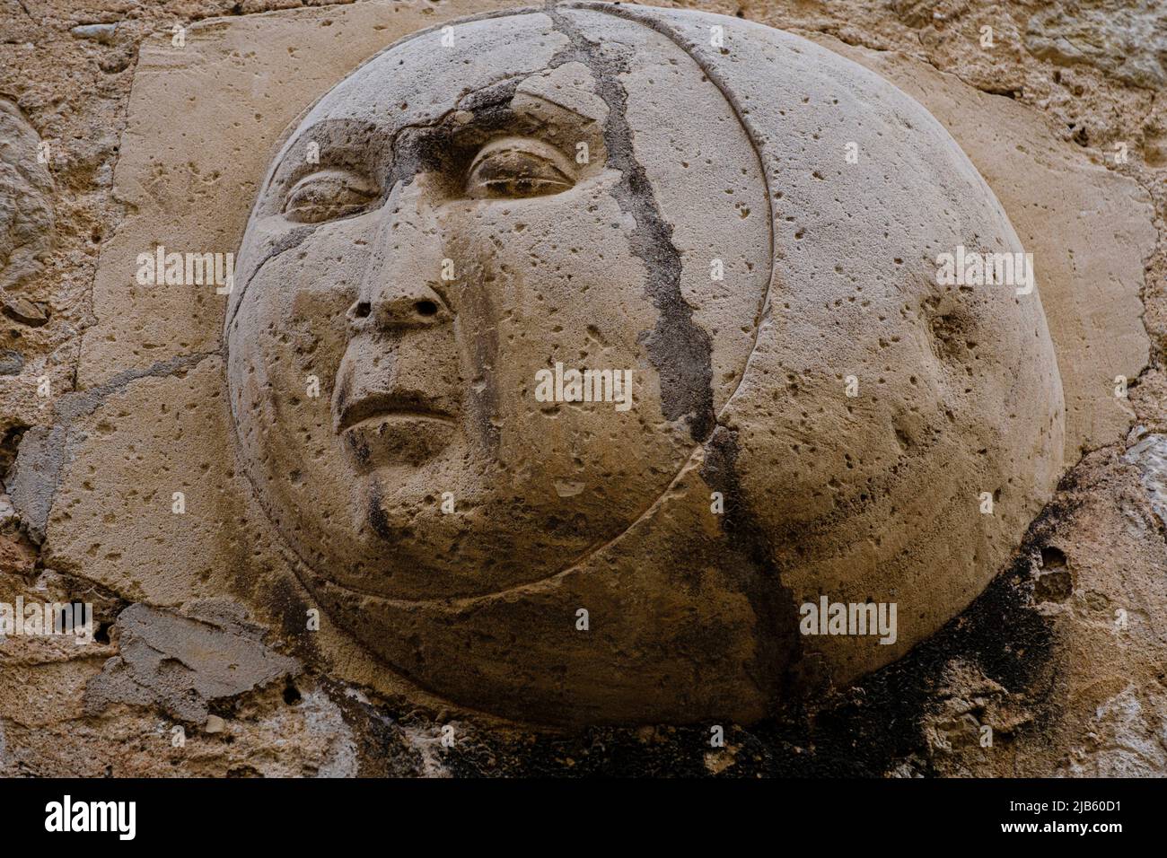 Carved relief of a moon with face, Ca n Sa Lluna, Sa Lluna street, Soller, Mallorca, Balearic Islands, Spain. Stock Photo