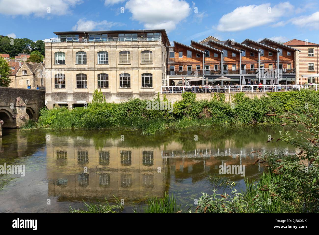 Historic town of Bradford on Avon picturing Kingston Mills and The Weaving Shed Restaurant with reflections in the River Avon, Wiltshire, England, UK Stock Photo