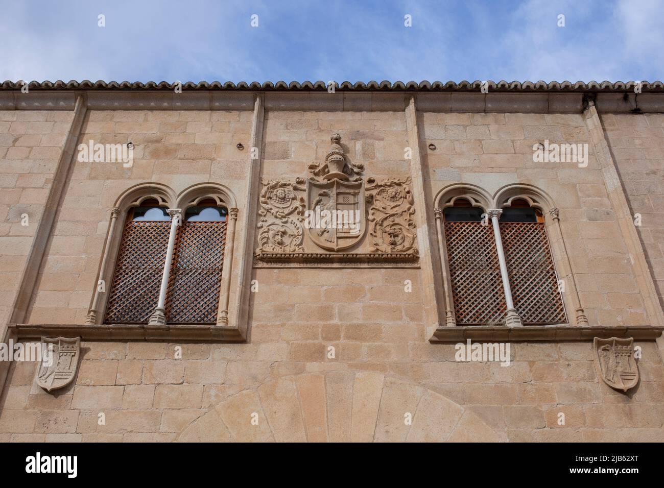 Beautiful mullioned windows at Palace of Mayoralgo. Caceres, Extremadura, Spain. Stock Photo