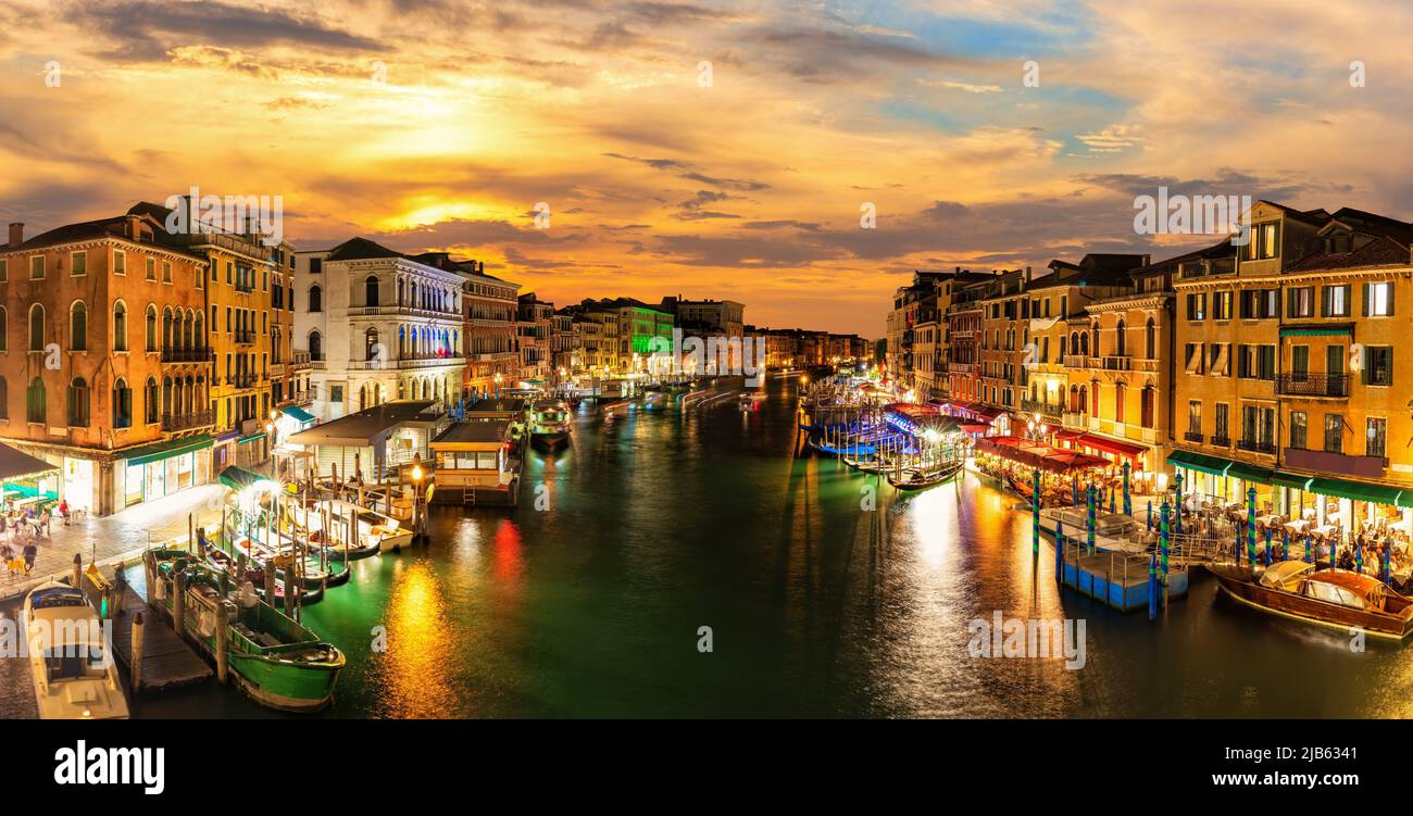 The Grand Canal buildings in twilight, view from Rialto Bridge, famous landmark of Venice, Italy. Stock Photo