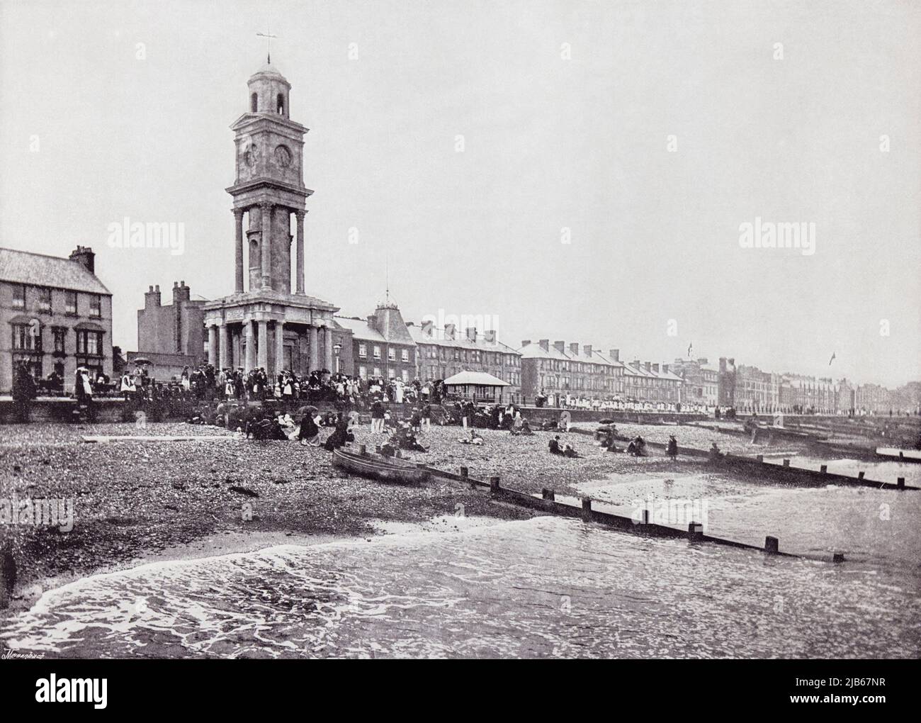 Herne Bay, Kent, England, showing the promenade and the clock tower in the 19th century. From Around The Coast, An Album of Pictures from Photographs Stock Photo