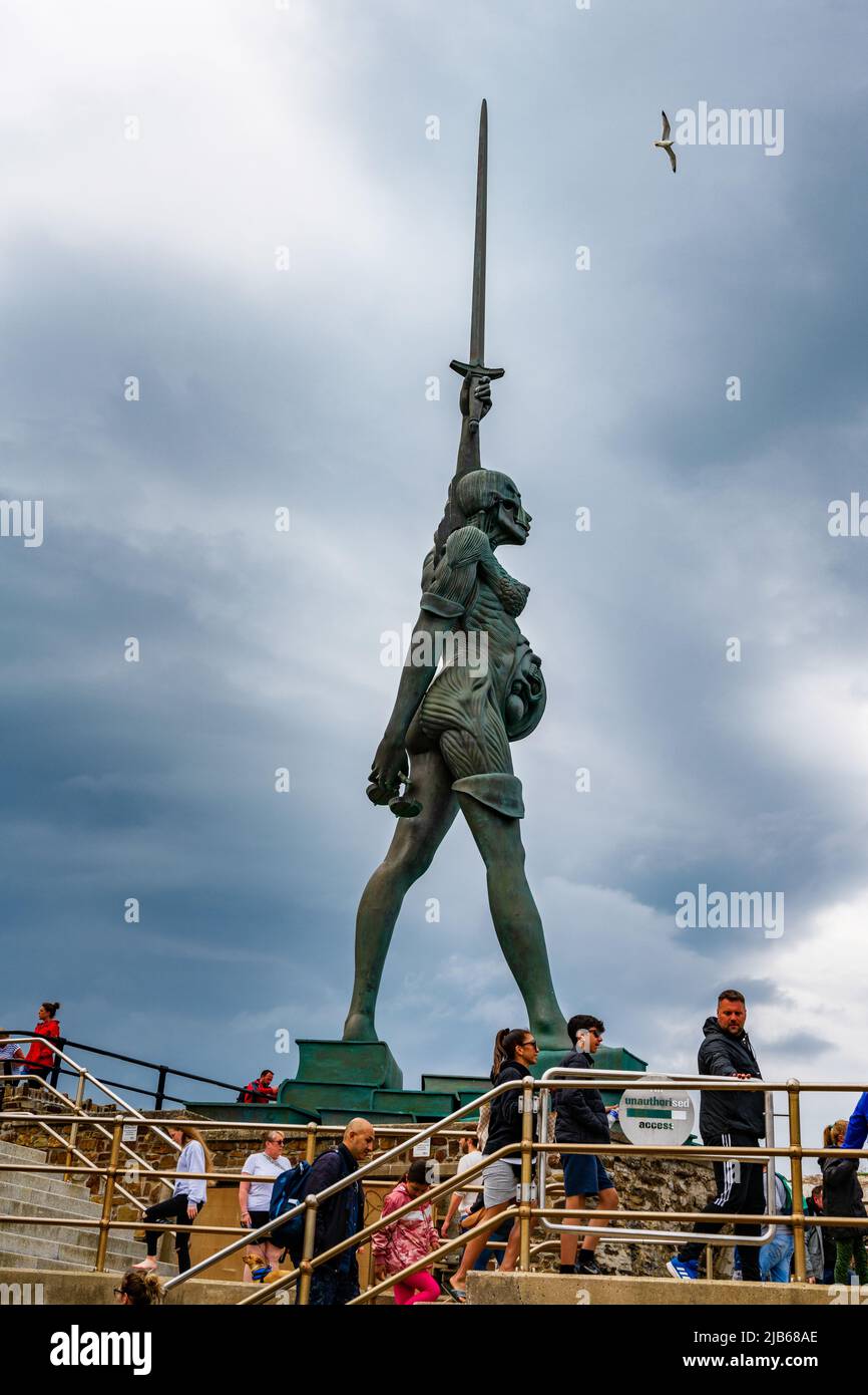 Verity (2012) is a steel and bronze statue created by Damien Hirst.  It stands on the pier at the entrance to Ilfracombe Harbour. Stock Photo