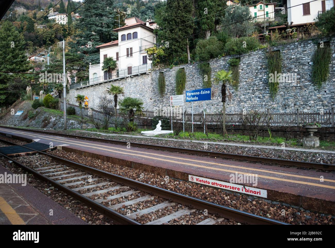 Railway Station served by Tiranoâ. “Lecco railway. Varenna, Lake Como Region, Province of Lecco, Lombardy, Italy. Stock Photo