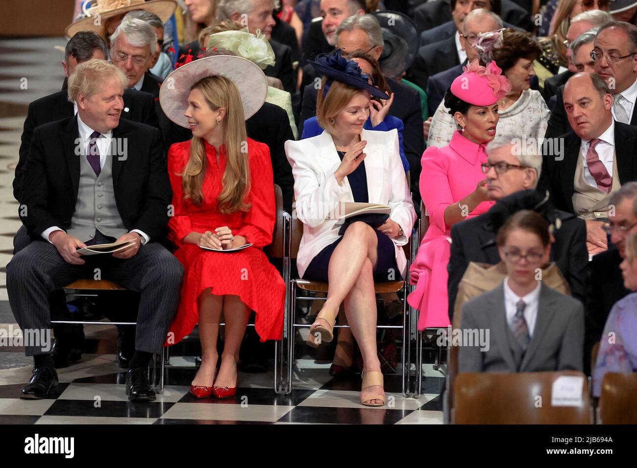 Prime Minister Boris Johnson, his wife Carrie Johnson (centre) and Foreign Secretary Liz Truss attend the National Service of Thanksgiving at St Paul's Cathedral, London, on day two of the Platinum Jubilee celebrations for Queen Elizabeth II. Picture date: Friday June 3, 2022. Stock Photo