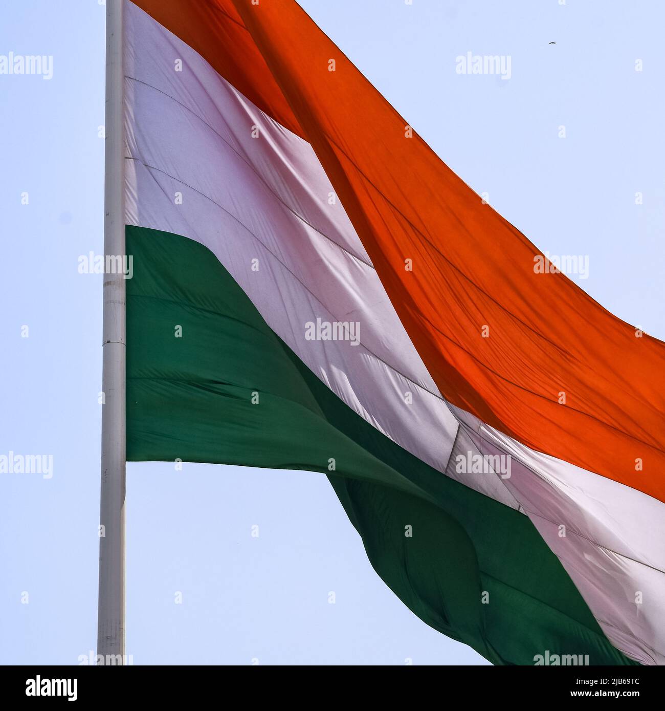 India flag flying high at Connaught Place with pride in blue sky, India ...