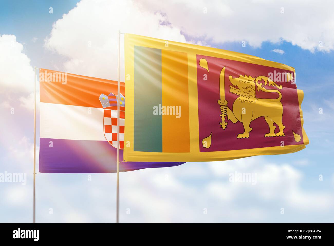 Sunny blue sky and flags of sri lanka and croatia Stock Photo