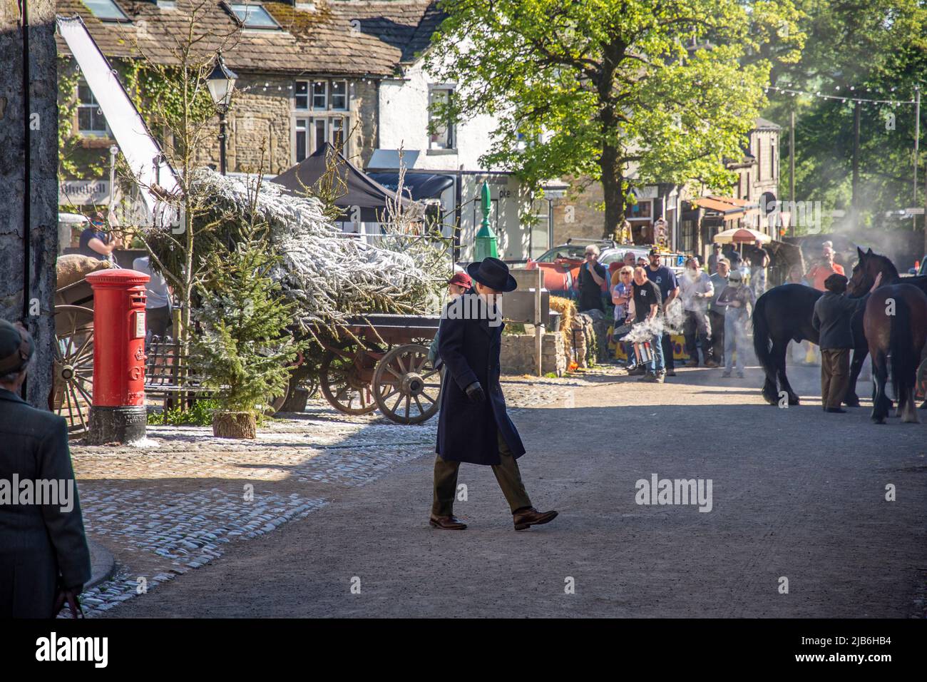 The filming of the TV series All Creatures Great and Small for a Christmas edition in the village of Grassington  a market town and civil parish in th Stock Photo