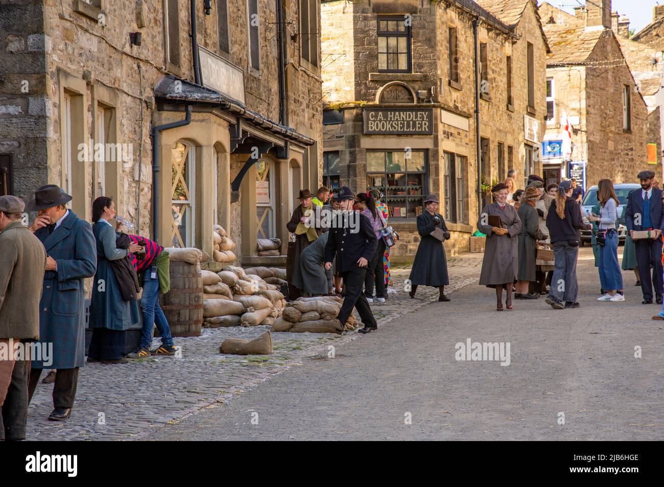 The filming of the TV series All Creatures Great and Small for a Christmas edition in the village of Grassington  a market town and civil parish in th Stock Photo