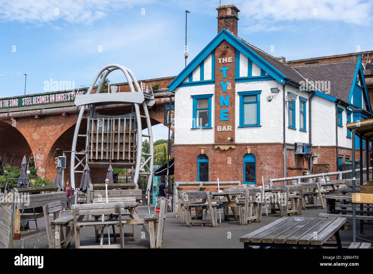 The Tyne bar, a vibrant pub at the eastern end of the Quayside, Newcastle upon Tyne, UK, where the Ouseburn river joins the River Tyne. Stock Photo