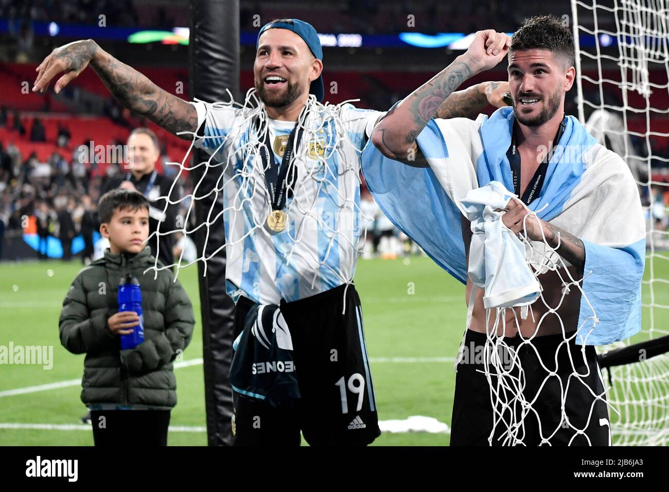 Nicolas Otamendi and Rodrigo De Paul of Argentina celebrate at the end of the Finalissima trophy 2022 football match between Italy and Argentina at We Stock Photo