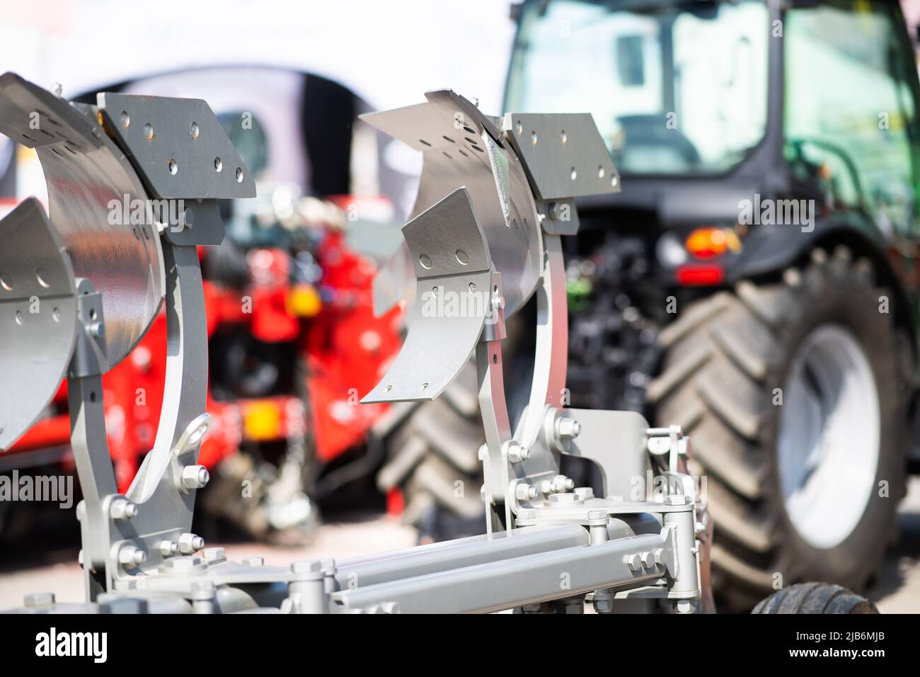 Plow machinery at the agricultural fair outdoor Stock Photo