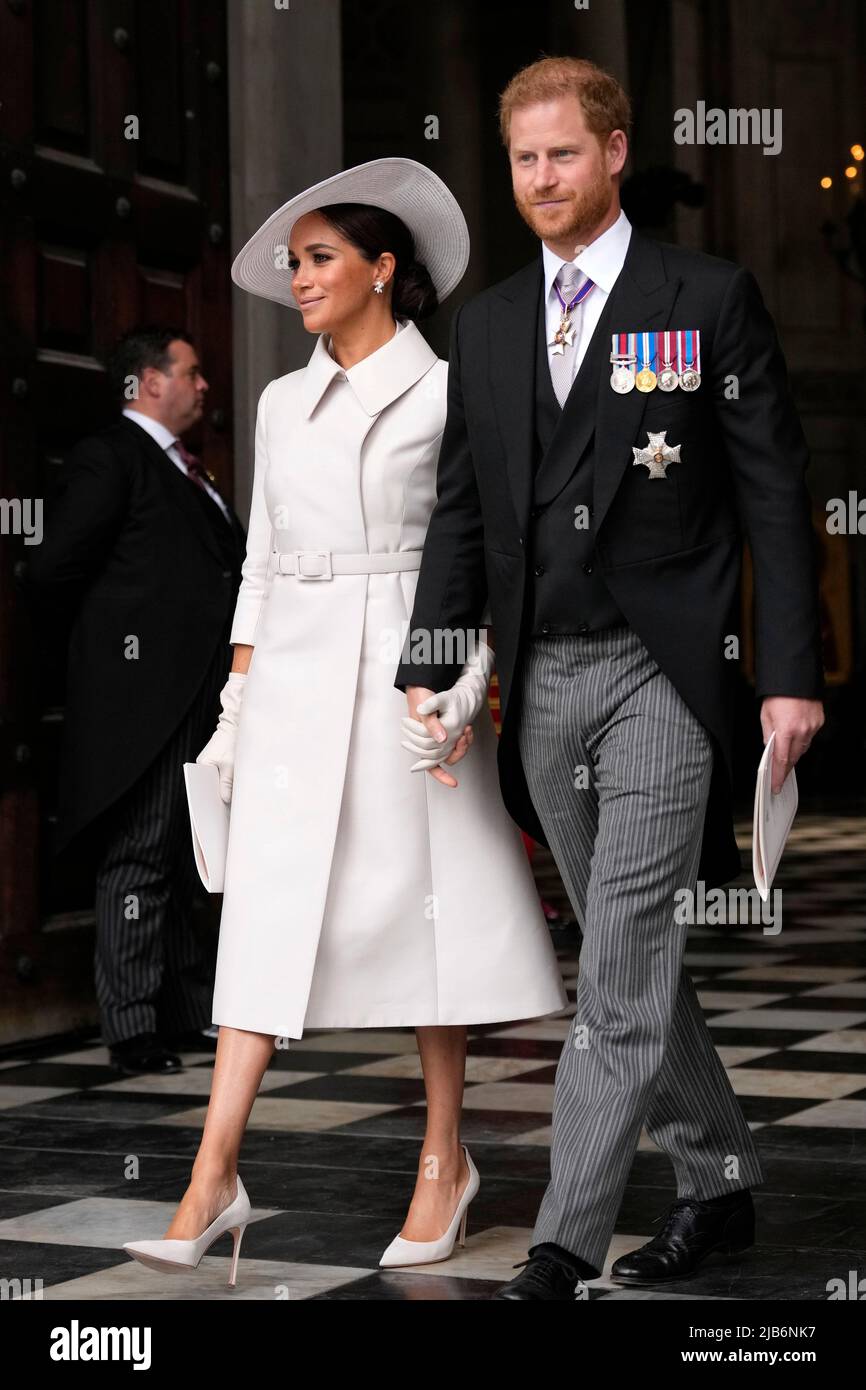The Duke and Duchess of Sussex leaving the National Service of Thanksgiving at St Paul's Cathedral, London, on day two of the Platinum Jubilee celebrations for Queen Elizabeth II. Picture date: Friday June 3, 2022. Stock Photo