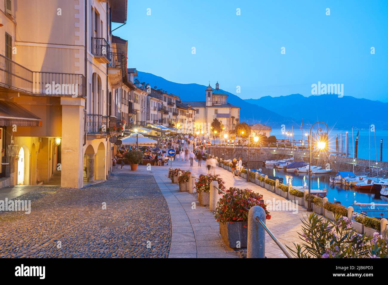 Promenade with historic house facades, in the background the Santuario della SS Pieta pilgrimage church, Cannobio, Piedmont, Italy, Europe Stock Photo