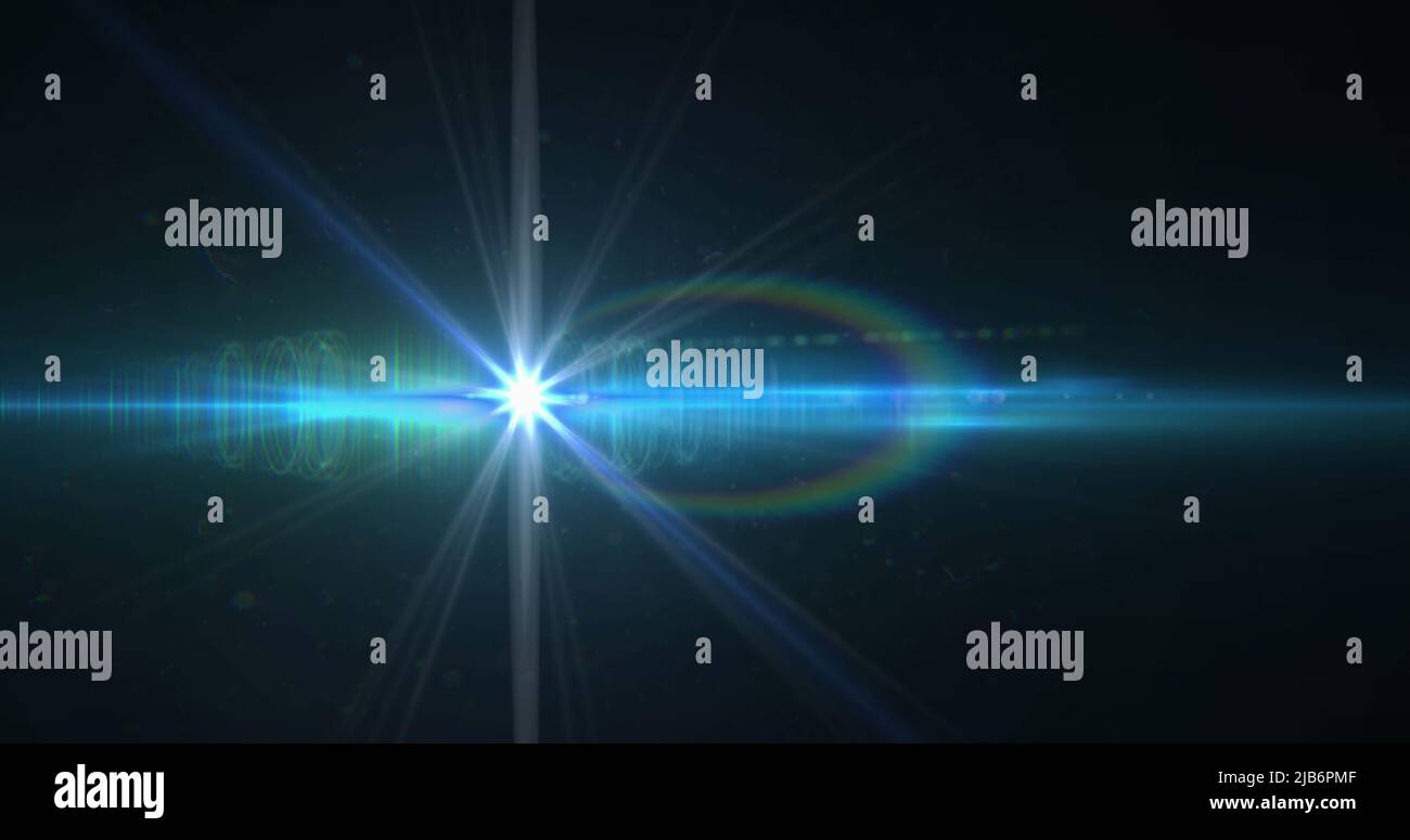 Image of white light with beam and curved prismatic lens flare on black