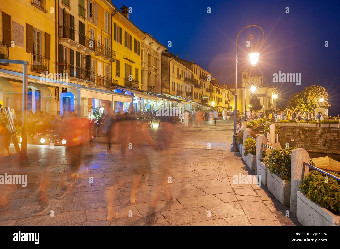 Promenade with historic house facades, in the background the Santuario della SS Pieta pilgrimage church, Cannobio Piedmont, Italy, Europe Stock Photo