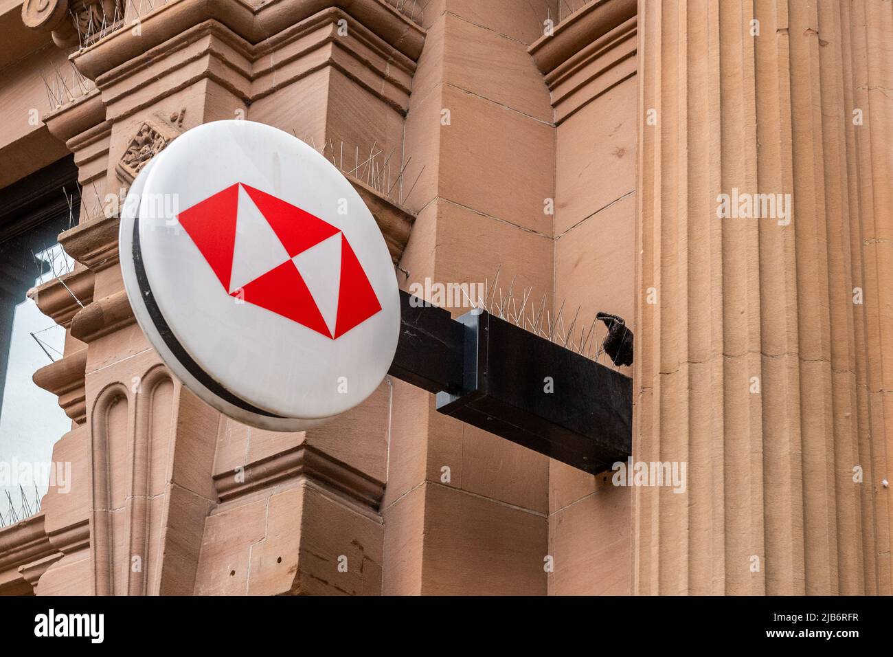 HSBC UK bank logo on the exterior of its branch in Lincoln, Lincolnshire, UK. Stock Photo