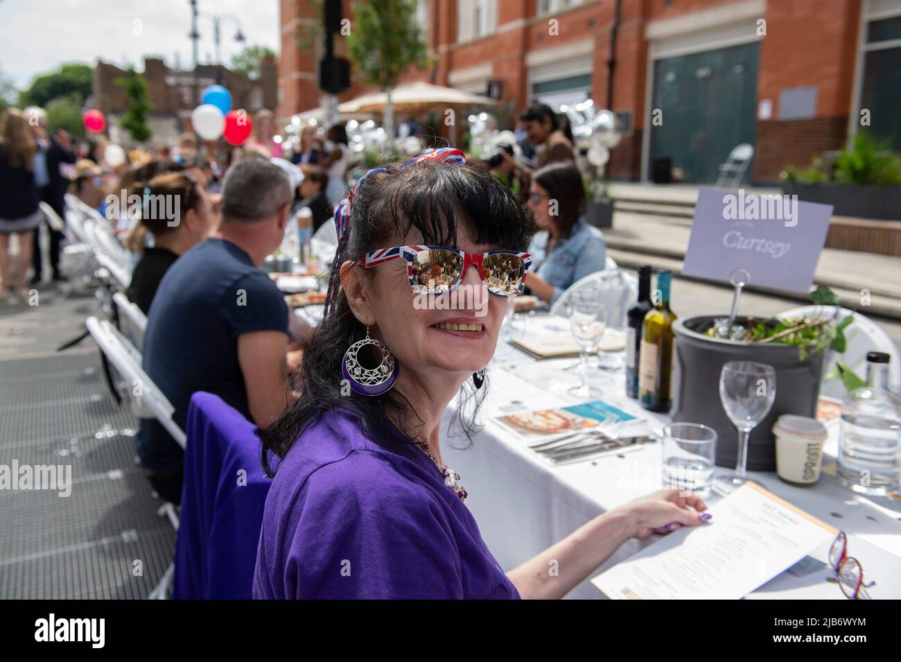 London 3rd June 2022: Party goers gather in Angel, Islington in North London on the second day of The Queen's Platinum Jubilee Weekend. Credit: claire doherty/Alamy Live News Stock Photo