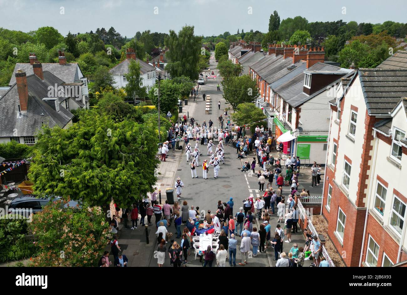 Leicester, Leicestershire, UK. 3rd June 2022.  Residents watch Leicester Morris Men dance during the Knighton Church Road street party to celebrate the Queen's Platinum Jubilee. Credit Darren Staples/Alamy Live News. Stock Photo