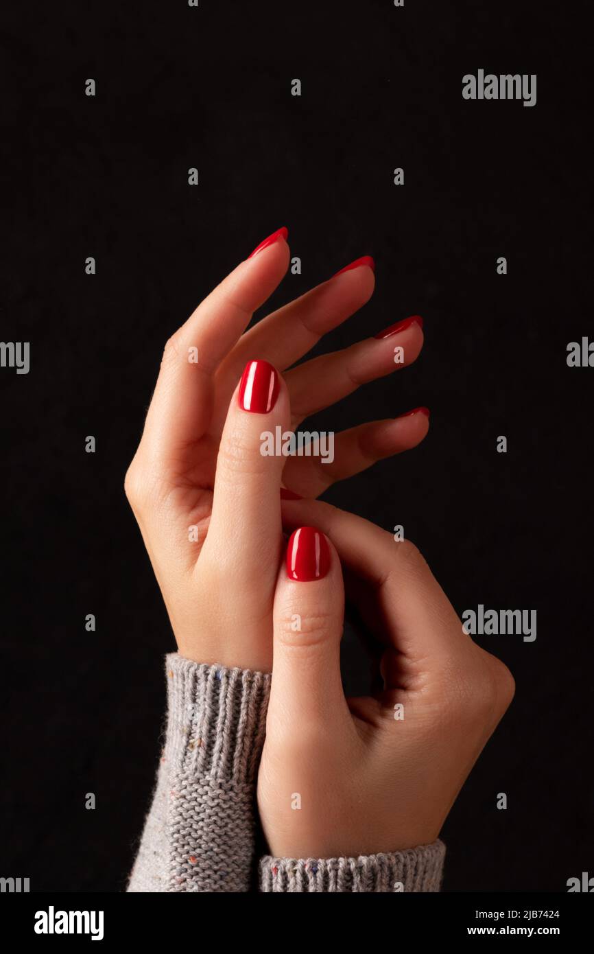 Red finger nail polish hi-res stock photography and images - Alamy
