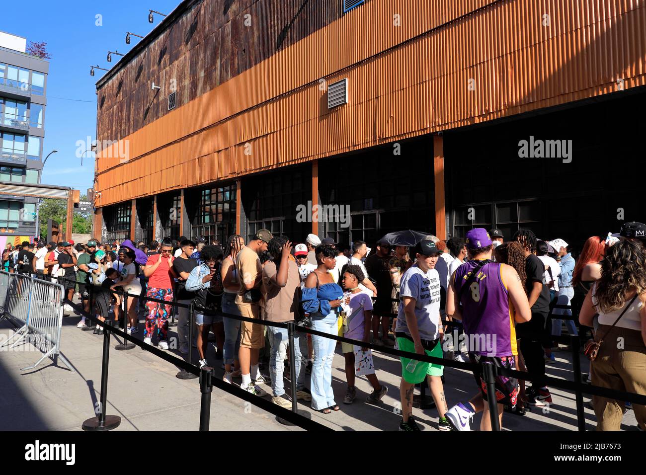 Visitors waiting in line to go into the Louis Vuitton and Nike Air Force 1 by Virgil Abloh exhibition at the Greenpoint Terminal Warehouse in Greenpoint. Brooklyn.New York City.USA Stock Photo