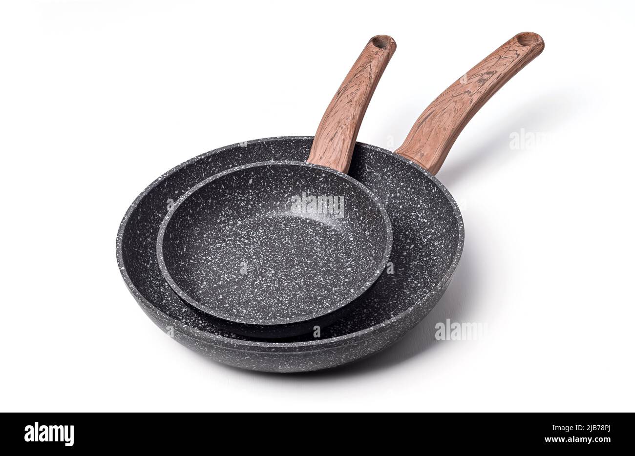 Non stick frying pans isolated on white background. Stock Photo