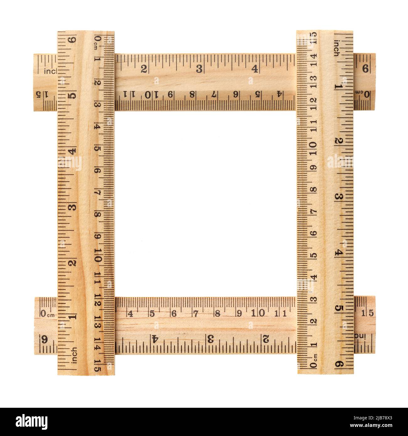 Empty square picture frame, made of four wooden rulers, isolated on white background Stock Photo