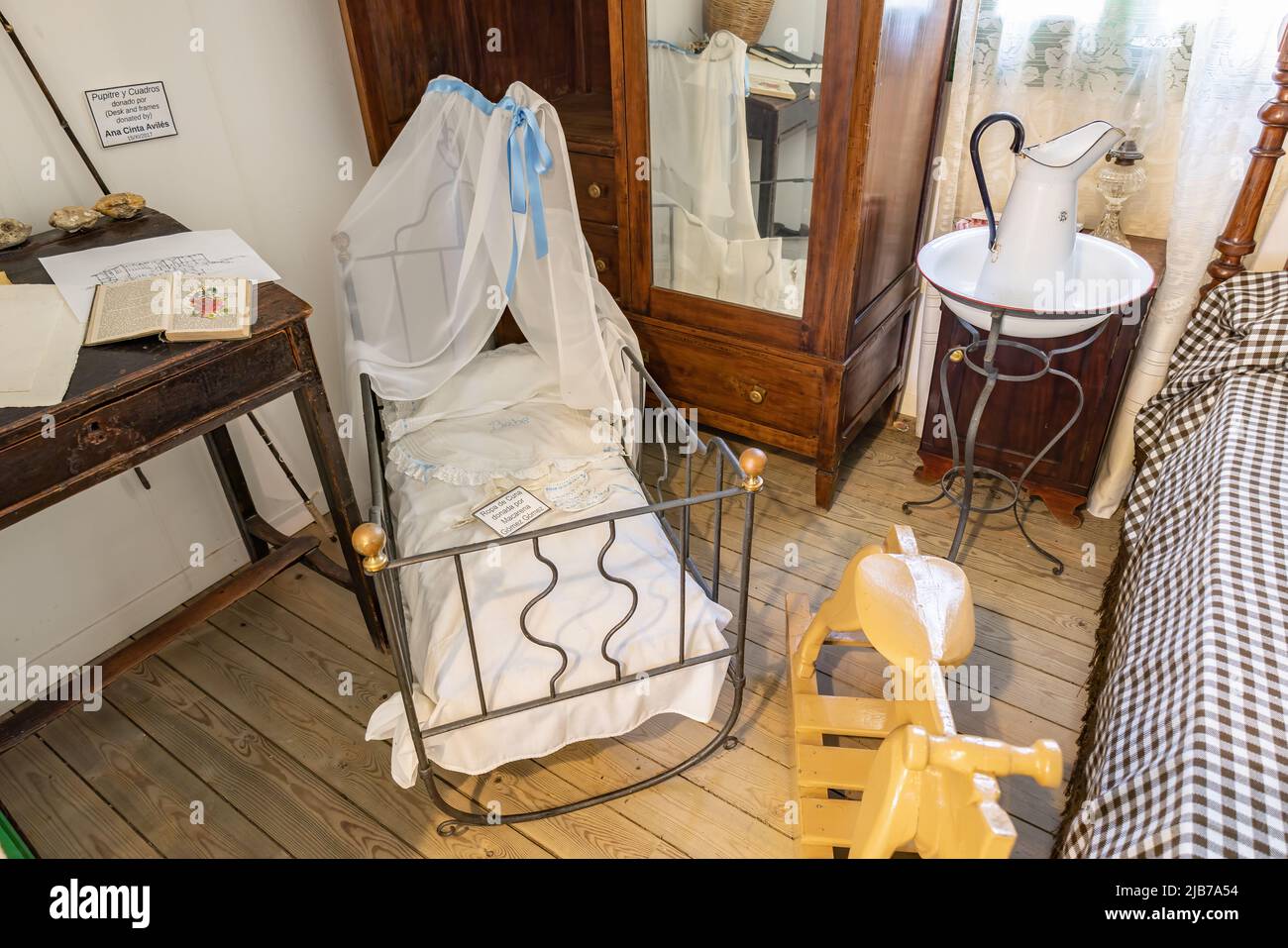 Punta Umbria, Huelva, Spain - April 27, 2022: Bedroom Inside of a english  summer house in Punta Umbria, build in the late nineteenth century, around  1 Stock Photo - Alamy