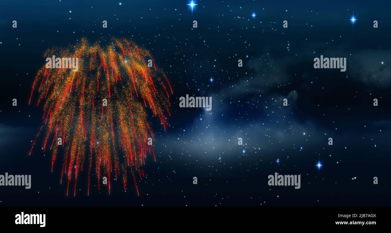 Image of colourful christmas and new year firework exploding in starry night sky Stock Photo